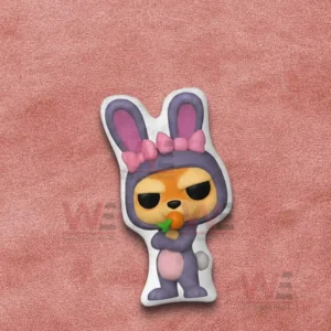 Cartoon rabbit shaped pillow on a pink fabric background!