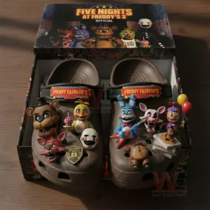 Branded box presentation with decorated clogs covered in character charms and bold visual details!