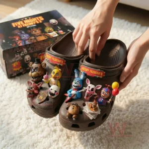 Five Nights At Freddy's 2 Offical Freddy Fazbear;'s Crocs Clogs with Charm 4 Hands displaying themed clogs with character charms in a bright indoor setting!