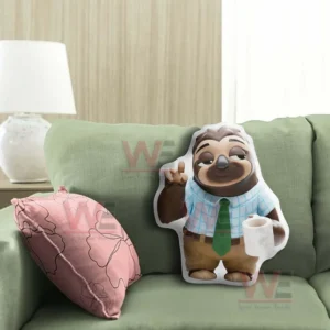 Sloth character pillow with coffee mug sitting on a green sofa in a warm and peaceful living space!