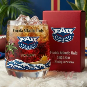 FAU themed whiskey glass with ice and coastal design beside a red Florida Atlantic Owls box in a sporty interior!