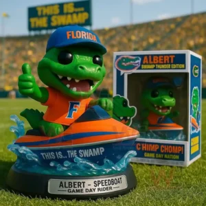Florida alligator mascot figure riding an orange speedboat on a football field with a themed box nearby!