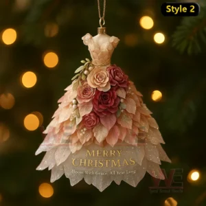 A pink floral Christmas dress ornament with roses layered petals pearls and festive lettering!