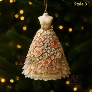A cream floral Christmas dress ornament decorated with blossoms roses leaves and festive text!