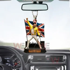 Freddie Mercury 80 Years of a Legend 3D Car Ornament 5 Freddie Mercury rearview mirror ornament hanging in a car showing a yellow jacket figure in front of a Union Jack flag with a small nameplate base.
