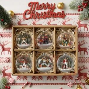 Freddie Mercury Christmas Ornament 9 The image displays a set of six transparent ornaments in a holiday box each holding a performer scene with snow trees and gifts.