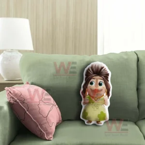 Cartoon girl pillow with green dress standing on a green sofa in a calm living room!