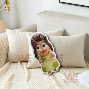 Cartoon girl pillow with green dress leaning on a beige sofa with soft pillows!
