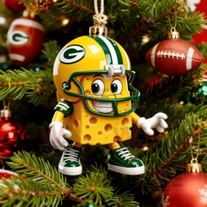 A Christmas ornament of a smiling cheese character dressed in green and yellow football gear hanging on a decorated tree!