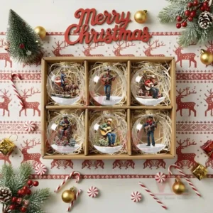 Box of six cowboy musician Christmas ornaments with holiday decorations around it!
