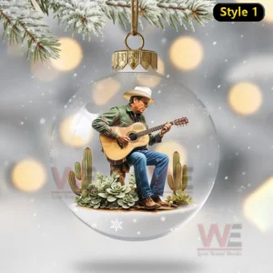 Christmas ornament globe with cowboy sitting among cacti playing guitar!