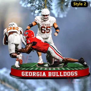 Georgia Bulldogs defensive players executing a gang tackle Ornament 3 A Georgia Bulldogs defender tackling an opponent on a miniature hanging football field ornament featuring the team name at the bottom!
