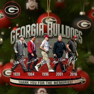 A lineup of Georgia Bulldogs football coaches displayed with their respective years beneath them set against a festive background with a thank you message honoring their service!