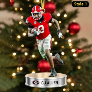 A CJ Allen ornament showing him running with the ball suspended above a nameplate in front of a Christmas tree!
