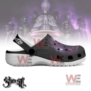 Side profile clogs with purple skull artwork and white sole design.