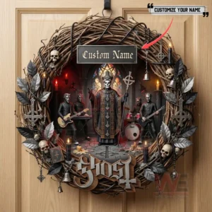 Gothic decorative wreath with dark music band figures skull accents candles and a custom name plaque hanging on a wooden door!