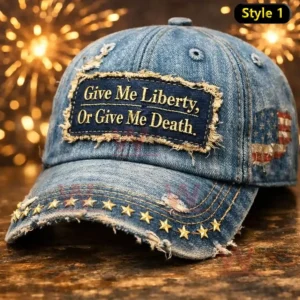 Distressed blue denim cap with a frayed Give Me Liberty Or Give Me Death patch gold stars on the brim and a small American flag patch on the side.