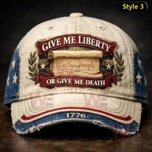Distressed white and blue cap with an embroidered Give Me Liberty Or Give Me Death emblem and 1776 stitched on the brim.