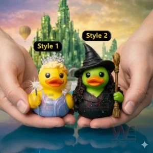 Hands holding a yellow princess rubber duck with crown and wand next to a green witch rubber duck with black hat curly hair and broom in front of a fantasy green city background.