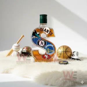 An S shaped bottle with Bay Area team logos stands on a fluffy rug with sports accessories around it!