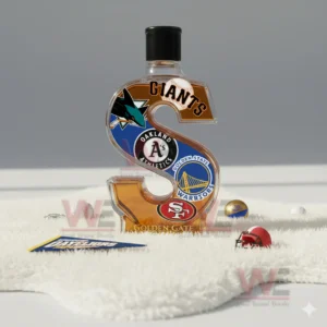 An S shaped bottle marked with Bay Area team logos stands on a white rug with sports themed props around it!