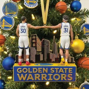 An ornament of two basketball players on a decorated Christmas tree with a city backdrop and the team name shown on the base!