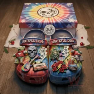 Colorful Grateful Dead themed Christmas clogs with assorted charms placed before a tie dye box!