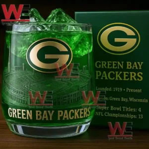 Green Bay Packers 4x Super Bowl Whiskey Glass 7 A close up Green Bay Packers glass with glowing green ice beside a dark green team box!