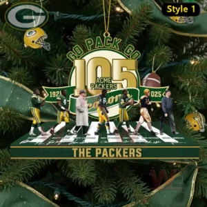 Ornament of Green Bay Packers greats displayed on a Christmas tree with figures standing on a platform labeled The Packers!