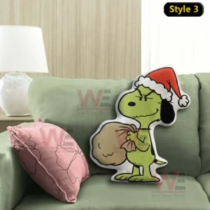 Grinch x Snoopy Custom Shaped Pillow 7 Green dog character pillow with santa hat and gift bag displayed on a green sofa!