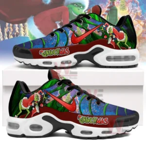Side view of a multicolor holiday inspired sneaker with festive artwork bold branding and a thick air cushioned sole against a winter themed background!