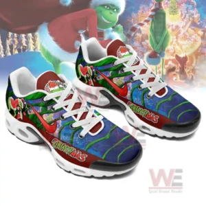 Grinchmas Air Max Plus Sneakers 6 Angled view of two festive sneakers with white laces colorful patterns and cushioned soles displayed on a clean background!