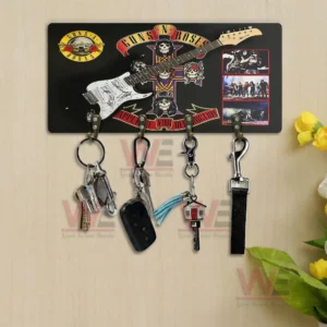 Guns N’ Roses Appetite for Destruction Personalized Wall Key Holder 6 Rock themed wall key holder with guitar artwork and multiple hooks displayed above a wooden table in a cozy interior!