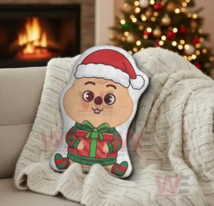 Han Quokka Stray Kids Custom Shaped Pillow 7 Quokka christmas pillow with santa hat and gift placed near a fireplace and holiday tree!
