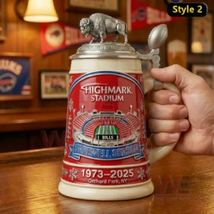 Red Buffalo Bills Highmark Stadium farewell season beer stein with buffalo lid topper held in a hand on a wooden table in a warm Bills themed room!