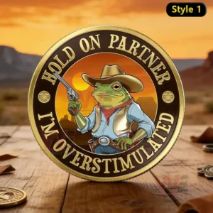 Commemorative coin with a cowboy frog character centered against a warm western sunset background!