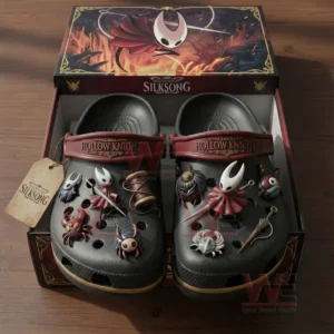 Dark Hollow Knight Silksong clogs placed in a themed box with multiple character charms and artistic packaging!