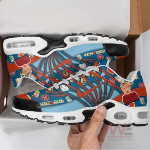 Blue and red Home Alone shoes with character illustrations held above an open shoe box!