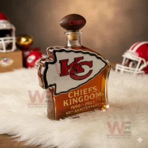 Arrow shaped Chiefs bottle on white fur with football helmets and warm background decor!