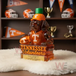 Orange dog shaped Tennessee Volunteers bottle on white fur with helmets pennants and trophies behind it!