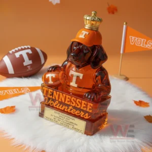 Crowned Tennessee mascot bottle on white fur with football and orange themed decor!