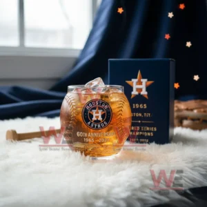 Houston Astros anniversary baseball shaped glass and matching box displayed on a soft white surface with a bat and decor in the background!