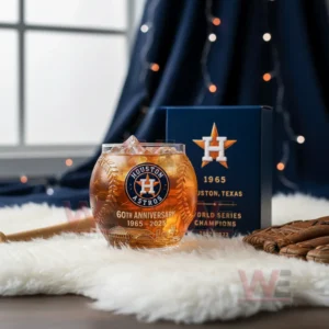 Houston Astros baseball themed glass and box positioned on a white surface with decorative lights and sports items behind them!