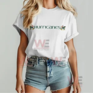 Front view of a white Hurricanes shirt with green lettering and small team mascots!