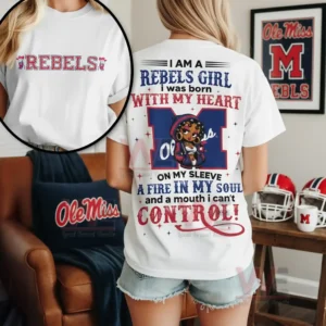 I am a Rebels Girl Ole Miss Rebels Shirt 5 Person wearing a white Rebels shirt indoors with sports decor and relaxed atmosphere!