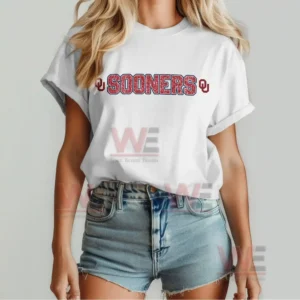Front view of a white Sooners team shirt with bold text design on the chest!