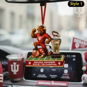 Indiana Hoosiers mascot in a red jersey standing on a rival next to a Big Ten trophy in a car setting!