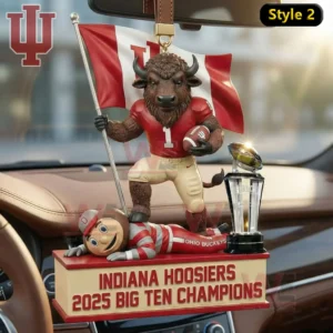 Indiana Hoosiers mascot holding a flag and standing on a rival next to a Big Ten trophy inside a car!