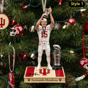 A Fernando Mendoza ornament showing him lifting a trophy above a nameplate base on a decorated Christmas tree!
