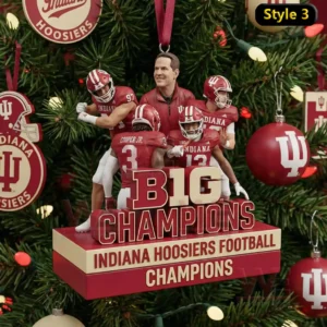 An Indiana Hoosiers championship ornament with players and a coach celebrating atop a labeled base on a Christmas tree!